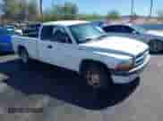 2002 Dodge Dakota Sport z VIN 1B7GL32X12S559114, wystawiony jako IAAI lot #42854090 z przebiegiem 141 238 mil mil oraz . Historia ofert i sprzedaży dostępna na DreamBid. Obrazek 1.