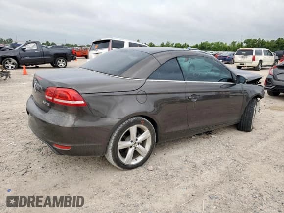 ✅ 2012 Volkswagen Eos Executive • VIN: WVWFW7AH8CV011891 • Lot: 66943885. Listed on Copart with 65,939 mi. Free auction sales archive from the USA and detailed vehicle history report at DreamBid. Image 3.