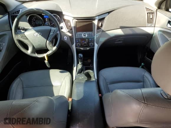 2013 Hyundai Sonata Limited с VIN KMHEC4A49DA070517, выставлен на аукционе Copart как лот 87459925 с пробегом 147 318 миль миль и Списание • Salvage title. История ставок и продаж доступна на DreamBid. Изображение 8.