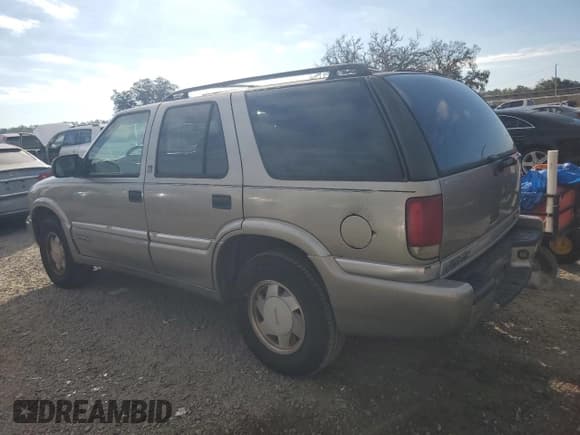 ✅ 2000 GMC Jimmy SLS • VIN: 1GKCS13W8Y2264424 • Лот: 86987515. Опубликован ранее на Copart с пробегом 119 228 миль. Бесплатный доступ к архиву аукционных продаж из США и подробный отчёт об истории автомобиля на DreamBid. Изображение 2.