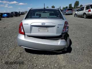 2009 Hyundai Accent Auto GLS z VIN KMHCN46C39U315786, wystawiony jako Copart lot #67562734 z przebiegiem 143 444 mil mil oraz Szkoda całkowita • Salvage title. Historia ofert i sprzedaży dostępna na DreamBid. Obrazek 6.