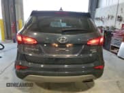 ✅ 2017 Hyundai Santa Fe 2.4L • VIN: 5XYZUDLB8HG420675 • Лот: 90927905. Опубликован ранее на Copart с пробегом 64 271 миль. Бесплатный доступ к архиву аукционных продаж из США и подробный отчёт об истории автомобиля на DreamBid. Изображение 6.