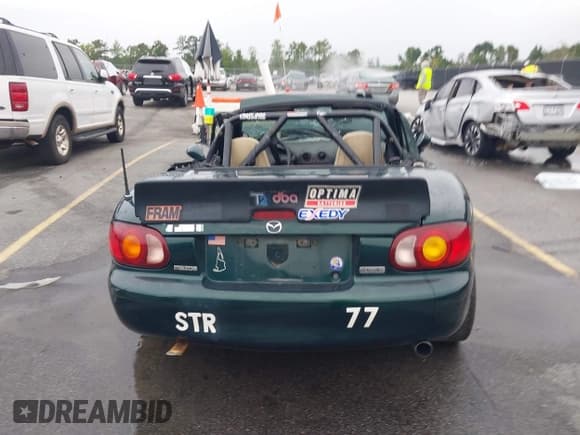 ✅ 1999 Mazda MX-5 Miata • VIN: JM1NB3535X0131696 • Lot: 42887205. Listed on IAAI with Not provided. Free auction sales archive from the USA and detailed vehicle history report at DreamBid. Image 16.