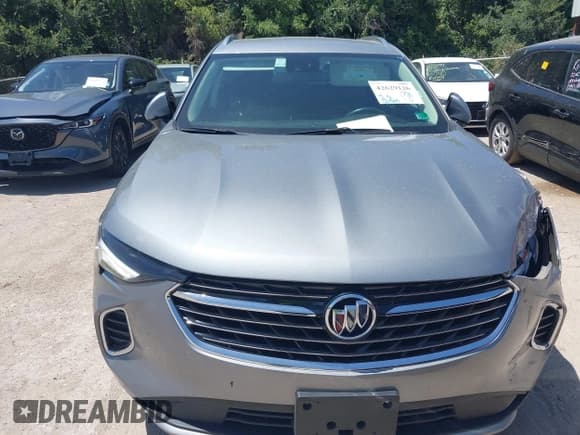 ✅ 2023 Buick Envision Essence • VIN: LRBFZNR47PD069708 • Lot: 42629126. Listed on IAAI with 57,701 mi. Free auction sales archive from the USA and detailed vehicle history report at DreamBid. Image 12.