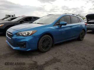 ✅ 2018 Subaru Impreza Premium • VIN: 4S3GTAD6XJ3733585 • Lot: 70594215. Listed on Copart with 72,417 mi. Free auction sales archive from the USA and detailed vehicle history report at DreamBid. Image 1.