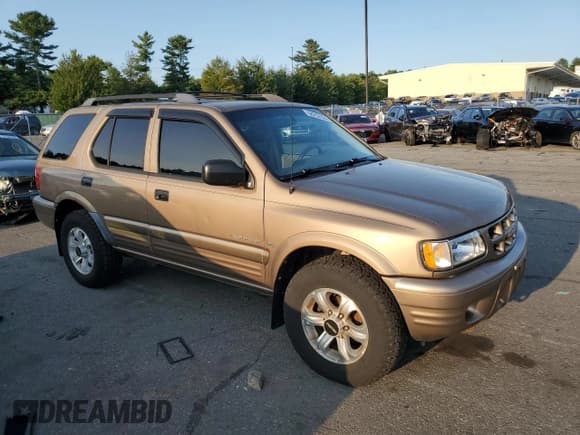 ✅ 2001 Isuzu Rodeo S • VIN: 4S2CK58W314334096 • Lot: 68262924. Listed on Copart with 140,657 mi. Free auction sales archive from the USA and detailed vehicle history report at DreamBid. Image 4.