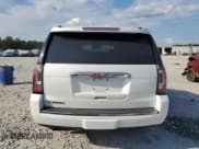 ✅ 2016 GMC Yukon Denali • VIN: 1GKS2CKJ4GR474599 • Lot: 81720845. Wystawiony na Copart z przebiegiem 68 227 mil. Bezpłatny archiwum sprzedaży aukcyjnych z USA i szczegółowy raport historii pojazdu na DreamBid. Zdjęcie 6.