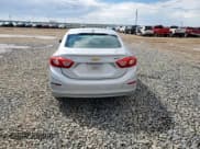 ✅ 2017 Chevrolet Cruze Premier • VIN: 1G1BF5SM0H7101474 • Lot: 80303235. Listed on Copart with 138,191 mi. Free auction sales archive from the USA and detailed vehicle history report at DreamBid. Image 6.