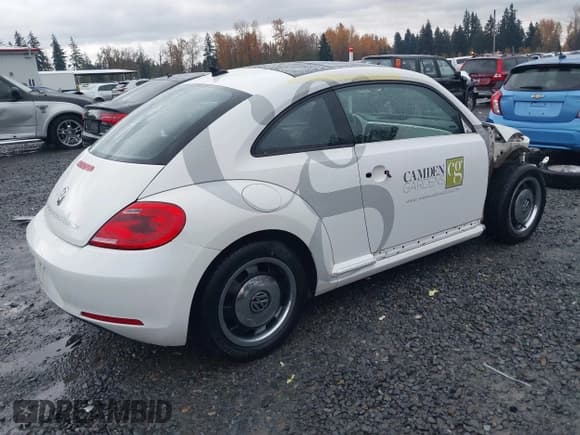 ✅ 2013 Volkswagen Beetle 2.5L • VIN: 3VWJP7AT7DM619969 • Lot: 43594617. Listed on IAAI with 10,181 mi. Free auction sales archive from the USA and detailed vehicle history report at DreamBid. Image 4.