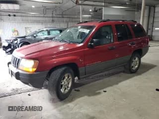 ✅ 2002 Jeep Grand Cherokee Laredo • VIN: 1J4GW48S52C229800 • Lot: 86864115. Listed on Copart with 195,739 mi. Free auction sales archive from the USA and detailed vehicle history report at DreamBid. Image 1.