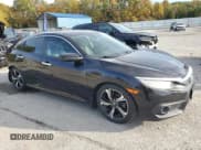 ✅ 2016 Honda Civic Touring • VIN: 19XFC1F99GE003364 • Lot: 90372945. Listed on Copart with 132,229 mi. Free auction sales archive from the USA and detailed vehicle history report at DreamBid. Image 4.