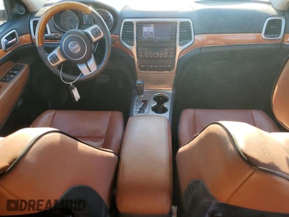 ✅ 2012 Jeep Grand Cherokee Overland • VIN: 1C4RJFCG3CC345994 • Lot: 86448425. Listed on Copart with 126,138 mi. Free auction sales archive from the USA and detailed vehicle history report at DreamBid. Image 8.
