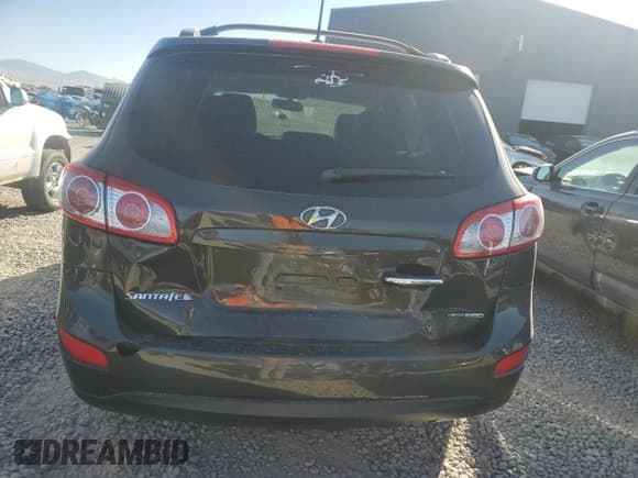 ✅ 2012 Hyundai Santa Fe Limited • VIN: 5XYZKDAG3CG110463 • Lot: 70720384. Listed on Copart with 123,928 mi. Free auction sales archive from the USA and detailed vehicle history report at DreamBid. Image 6.