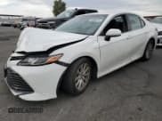 ✅ 2018 Toyota Camry LE • VIN: 4T1B11HK7JU116707 • Лот: 92363275. Опубликован ранее на Copart с пробегом 125 267 миль. Бесплатный доступ к архиву аукционных продаж из США и подробный отчёт об истории автомобиля на DreamBid. Изображение 1.