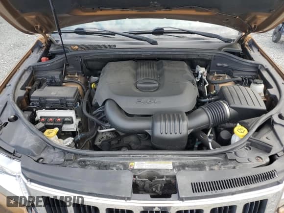 ✅ 2011 Jeep Grand Cherokee Laredo • VIN: 1J4RR4GGXBC697695 • Lot: 59696055. Listed on Copart with 148,537 mi. Free auction sales archive from the USA and detailed vehicle history report at DreamBid. Image 12.