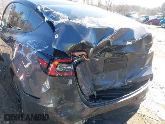 ✅ 2023 Tesla Model Y Long Range • VIN: 7SAYGAEE9PF905943 • Lot: 41444255. Listed on IAAI with 11,179 mi. Free auction sales archive from the USA and detailed vehicle history report at DreamBid. Image 6.