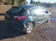 ✅ 2018 Chevrolet Cruze LT • VIN: 3G1BE6SM7JS645177 • Lot: 43475388. Listed on IAAI with 107,539 mi. Free auction sales archive from the USA and detailed vehicle history report at DreamBid. Image 4.