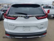 ✅ 2022 Honda CR-V Touring • VIN: 5J6RT6H95NL043897 • Lot: 43316993. Listed on IAAI with 154,584 mi. Free auction sales archive from the USA and detailed vehicle history report at DreamBid. Image 16.