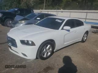 ✅ 2012 Dodge Charger SE • VIN: 2C3CDXBG1CH212088 • Lot: 86471135. Listed on Copart with 163,610 mi. Free auction sales archive from the USA and detailed vehicle history report at DreamBid. Image 1.