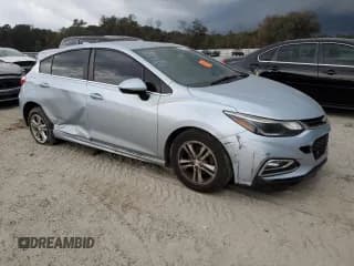 ✅ 2018 Chevrolet Cruze LT • VIN: 3G1BE6SM3JS588489 • Lot: 73535522. Listed on Copart with 120,012 mi. Free auction sales archive from the USA and detailed vehicle history report at DreamBid. Image 4.