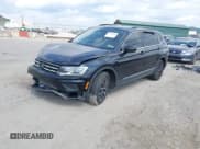 ✅ 2021 Volkswagen Tiguan SE • VIN: 3VV2B7AX6MM031264 • Лот: 43224608. Опубликован ранее на IAAI с пробегом 61 896 миль. Бесплатный доступ к архиву аукционных продаж из США и подробный отчёт об истории автомобиля на DreamBid. Изображение 2.