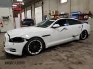 ✅ 2014 Jaguar XJ Portfolio • VIN: SAJWJ2GD2E8V69597 • Lot: 57798145. Wystawiony na Copart z przebiegiem 100 857 mil. Bezpłatny archiwum sprzedaży aukcyjnych z USA i szczegółowy raport historii pojazdu na DreamBid. Zdjęcie 1.