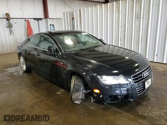 ✅ 2014 Audi A7 Premium Plus • VIN: WAUWGAFC0EN087094 • Лот: 86429665. Опубликован ранее на Copart с пробегом 72 644 миль. Бесплатный доступ к архиву аукционных продаж из США и подробный отчёт об истории автомобиля на DreamBid. Изображение 14.