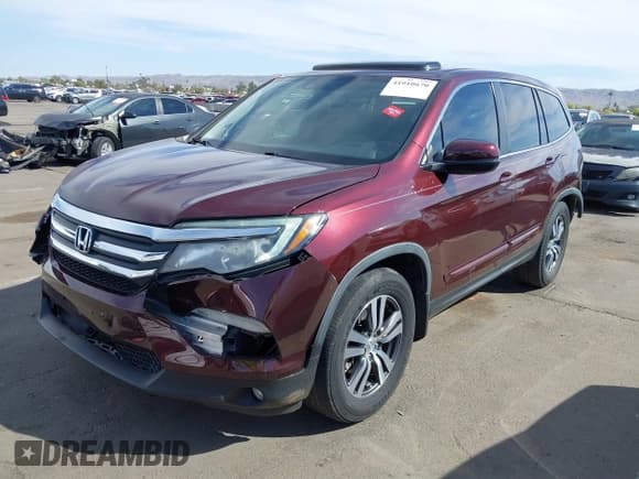 ✅ 2017 Honda Pilot EX-L • VIN: 5FNYF5H71HB027558 • Lot: 41910670. Listed on IAAI with 122,214 mi. Free auction sales archive from the USA and detailed vehicle history report at DreamBid. Image 18.
