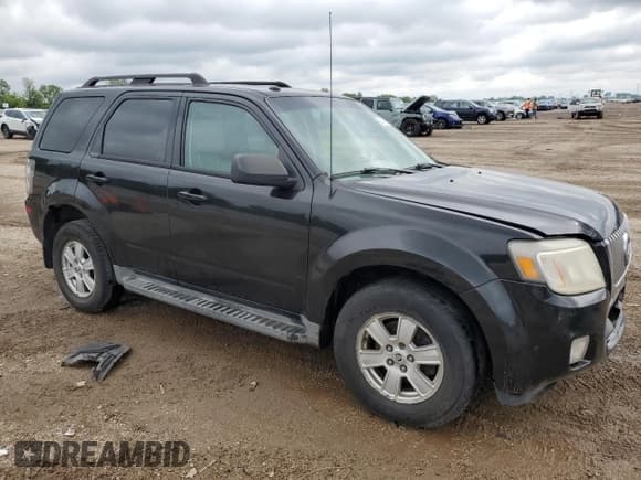 ✅ 2011 Mercury Mariner • VIN: 4M2CN9BG1BKJ06357 • Lot: 59747815. Listed on Copart with 170,730 mi. Free auction sales archive from the USA and detailed vehicle history report at DreamBid. Image 4.
