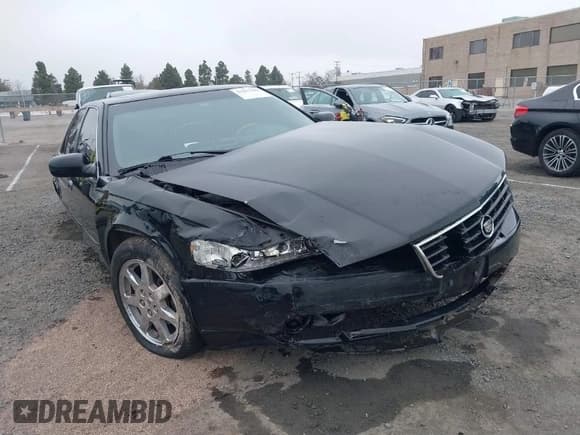 ✅ 2002 Cadillac Seville Touring STS • VIN: 1G6KY54982U239673 • Lot: 41657709. Wystawiony na IAAI z przebiegiem 92 224 mil. Bezpłatny archiwum sprzedaży aukcyjnych z USA i szczegółowy raport historii pojazdu na DreamBid. Zdjęcie 1.