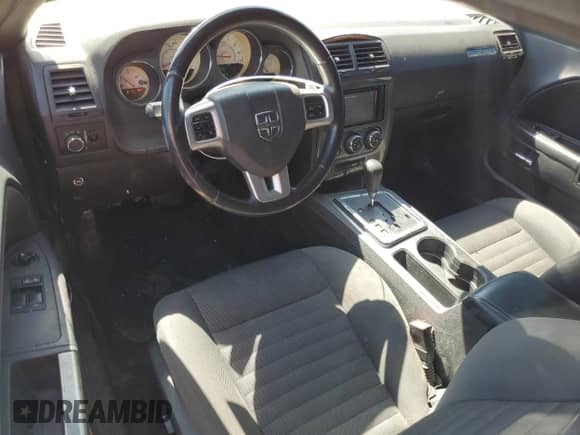 2013 Dodge Challenger SXT z VIN 2C3CDYAG4DH649382, wystawiony jako Copart lot #59992544 z przebiegiem 152 167 mil mil oraz Szkoda całkowita • Salvage title. Historia ofert i sprzedaży dostępna na DreamBid. Obrazek 8.