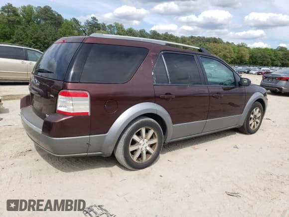✅ 2009 Ford Taurus X SEL • VIN: 1FMDK02W19GA01803 • Lot: 55794335. Listed on Copart with 184,811 mi. Free auction sales archive from the USA and detailed vehicle history report at DreamBid. Image 3.