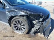 ✅ 2018 Tesla Model X 75D • VIN: 5YJXCBE21JF115561 • Lot: 39145954. Listed on IAAI with Not provided. Free auction sales archive from the USA and detailed vehicle history report at DreamBid. Image 6.