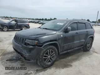 2017 Jeep Grand Cherokee Trailhawk с VIN 1C4RJFLT0HC723886, выставлен на аукционе Copart как лот 70457125 с пробегом 146 325 миль миль и Списание • Salvage title. История ставок и продаж доступна на DreamBid. Изображение 1.