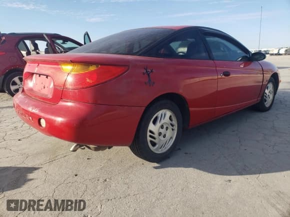 ✅ 2001 Saturn SC • VIN: 1G8ZP12801Z241043 • Лот: 93238175. Опубликован ранее на Copart с пробегом 190 547 миль. Бесплатный доступ к архиву аукционных продаж из США и подробный отчёт об истории автомобиля на DreamBid. Изображение 3.