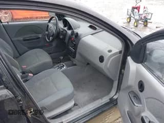 ✅ 2005 Chevrolet Aveo LT • VIN: KL1TG52605B480079 • Lot: 41757862. Wystawiony na IAAI z przebiegiem 163 561 mil. Bezpłatny archiwum sprzedaży aukcyjnych z USA i szczegółowy raport historii pojazdu na DreamBid. Zdjęcie 5.