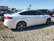 ✅ 2017 Ford Fusion Titanium • VIN: 3FA6P0D94HR119380 • Lot: 82580405. Listed on Copart with 119,203 mi. Free auction sales archive from the USA and detailed vehicle history report at DreamBid. Image 3.