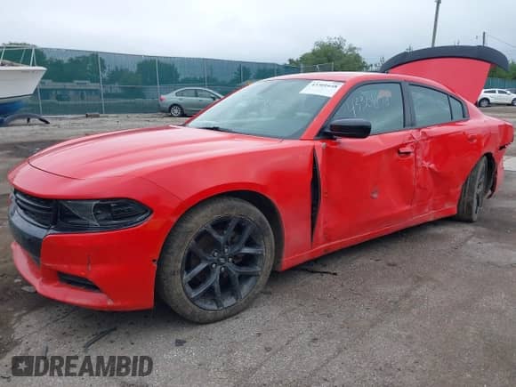 2022 Dodge Charger SXT with VIN 2C3CDXBG6NH162131, listed as a IAAI auction lot 43301648 with 63,975 mi miles and . Bid and sale history available at DreamBid. Image 2.