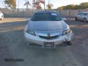 ✅ 2014 Acura TL Technology • VIN: 19UUA9E5XEA002526 • Lot: 43460168. Listed on IAAI with 98,679 mi. Free auction sales archive from the USA and detailed vehicle history report at DreamBid. Image 12.