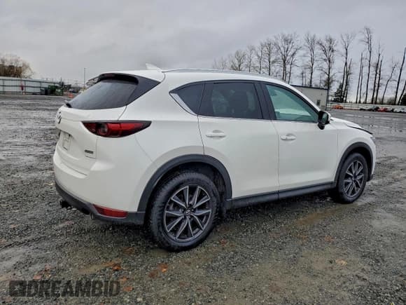 ✅ 2018 Mazda CX-5 Grand Touring • VIN: JM3KFBDM4J0337411 • Lot: 94065165. Listed on Copart with 51,618 mi. Free auction sales archive from the USA and detailed vehicle history report at DreamBid. Image 3.