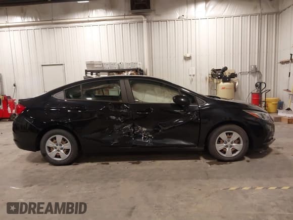 ✅ 2018 Chevrolet Cruze LS • VIN: 1G1BB5SM7J7131573 • Lot: 43507247. Listed on IAAI with 59,735 mi. Free auction sales archive from the USA and detailed vehicle history report at DreamBid. Image 13.