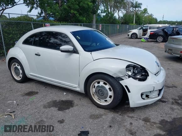 ✅ 2015 Volkswagen Beetle Fleet Edition • VIN: 3VWF17AT2FM656714 • Lot: 42698040. Listed on IAAI with 72,348 mi. Free auction sales archive from the USA and detailed vehicle history report at DreamBid. Image 3.