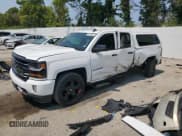 ✅ 2018 Chevrolet Silverado 1500 LT • VIN: 1GCVKREH7JZ360639 • Lot: 67134685. Listed on Copart with 144,527 mi. Free auction sales archive from the USA and detailed vehicle history report at DreamBid. Image 1.