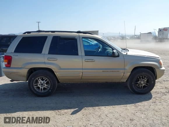 ✅ 2000 Jeep Grand Cherokee Limited • VIN: 1J4GW58N1YC242326 • Лот: 43247505. Опубликован ранее на IAAI с пробегом 261 511 миль. Бесплатный доступ к архиву аукционных продаж из США и подробный отчёт об истории автомобиля на DreamBid. Изображение 13.