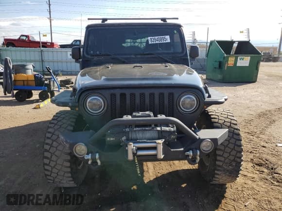 ✅ 2004 Jeep Wrangler Rubicon • VIN: 1J4FA69S74P737413 • Lot: 83940895. Wystawiony na Copart z przebiegiem 241 929 mil. Bezpłatny archiwum sprzedaży aukcyjnych z USA i szczegółowy raport historii pojazdu na DreamBid. Zdjęcie 5.