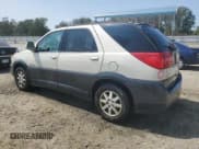 ✅ 2003 Buick Rendezvous CXL • VIN: 3G5DB03E03S599537 • Lot: 70845334. Wystawiony na Copart z przebiegiem 123 184 mil. Bezpłatny archiwum sprzedaży aukcyjnych z USA i szczegółowy raport historii pojazdu na DreamBid. Zdjęcie 2.