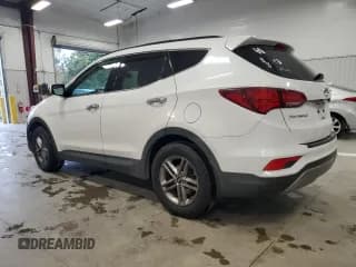 ✅ 2017 Hyundai Santa Fe 2.4L • VIN: 5NMZUDLB1HH010628 • Лот: 90281945. Опубликован ранее на Copart с пробегом 80 036 миль. Бесплатный доступ к архиву аукционных продаж из США и подробный отчёт об истории автомобиля на DreamBid. Изображение 2.