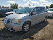 ✅ 2014 Chrysler Town & Country Touring • VIN: 2C4RC1BG9ER300809 • Lot: 71236925. Listed on Copart with 150,021 mi. Free auction sales archive from the USA and detailed vehicle history report at DreamBid. Image 1.