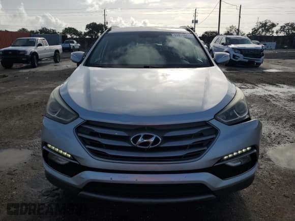 ✅ 2017 Hyundai Santa Fe 2.0T • VIN: 5XYZU4LA9HG429148 • Лот: 69970664. Опубликован ранее на Copart с пробегом 108 075 миль. Бесплатный доступ к архиву аукционных продаж из США и подробный отчёт об истории автомобиля на DreamBid. Изображение 5.