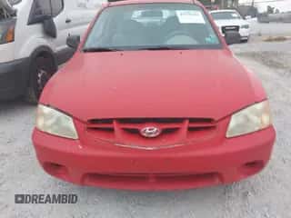 2002 Hyundai Accent GS z VIN KMHCG35C32U157056, wystawiony jako IAAI lot #41538381 z przebiegiem 127 518 mil mil oraz . Historia ofert i sprzedaży dostępna na DreamBid. Obrazek 6.